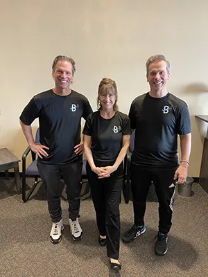 Chiropractor Oak Creek WI Daniel Hyatt With Team